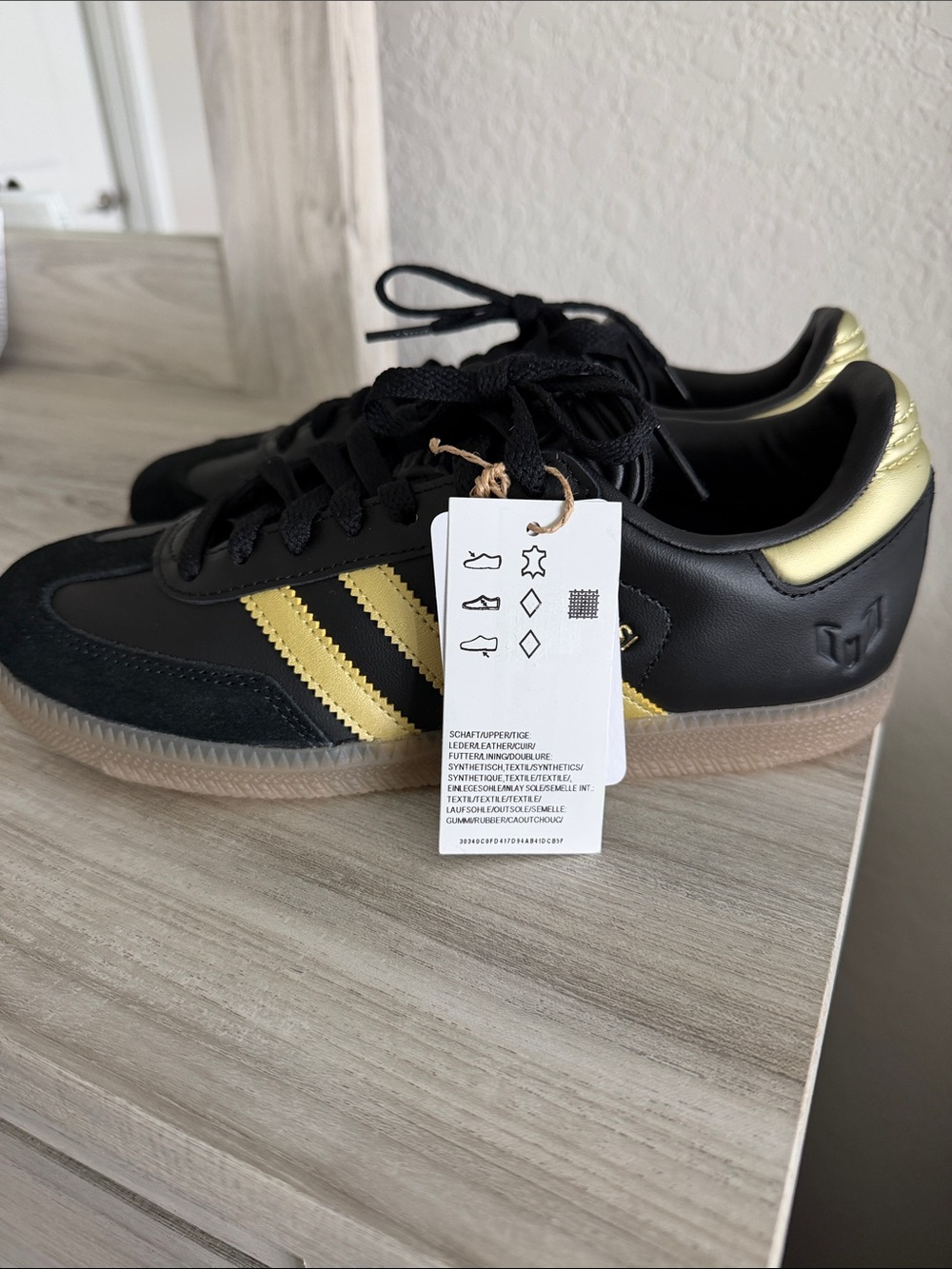 Adidas Women’s Black & Gold Athletic Sneakers